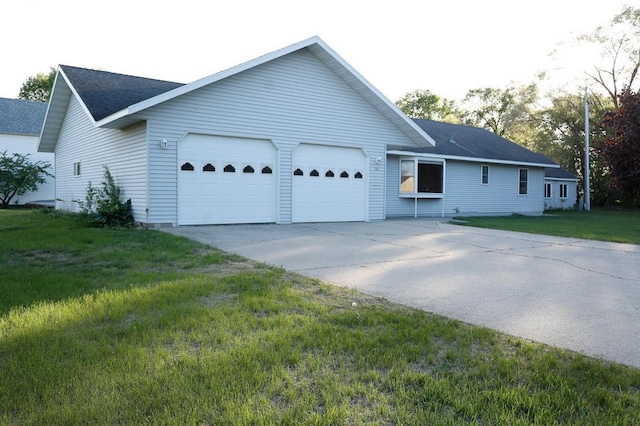 101 6th St NW, Perham, MN 56573 - ranch-style home with a garage, concrete driveway, a front yard, and a shingled roof