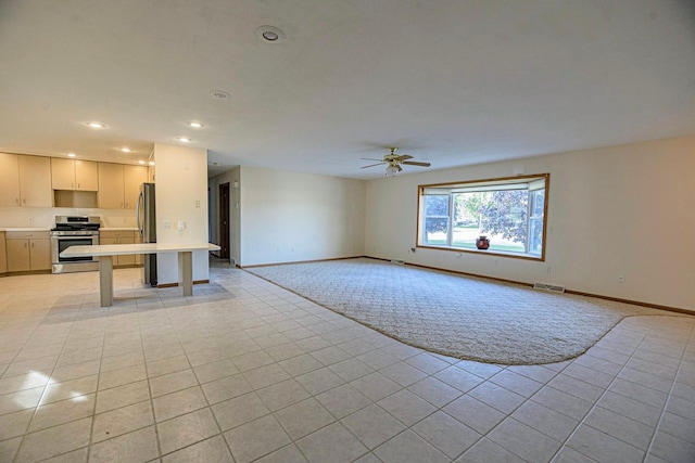 101 6th St NW, Perham, MN 56573 - unfurnished living room with a ceiling fan, baseboards, light tile patterned flooring, and recessed lighting