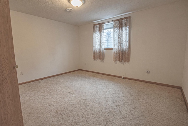 101 6th St NW, Perham, MN 56573 - carpeted spare room with a textured ceiling and baseboards