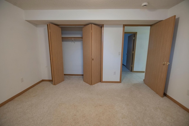 101 6th St NW, Perham, MN 56573 - unfurnished bedroom featuring light carpet, a closet, and baseboards