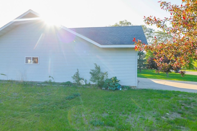 101 6th St NW, Perham, MN 56573 - view of home's exterior with a yard and roof with shingles