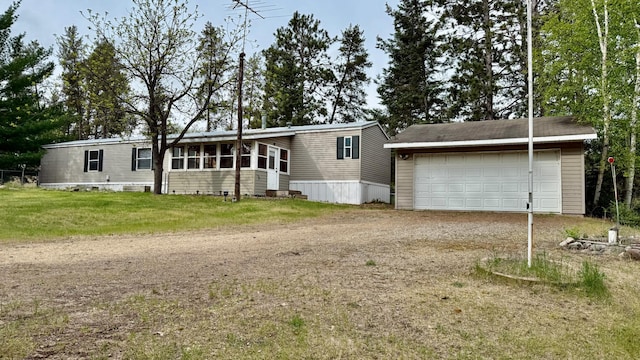 25673 Happy Hollow Rd, Park Rapids, MN 56470 - view of front of home featuring dirt driveway and a front lawn