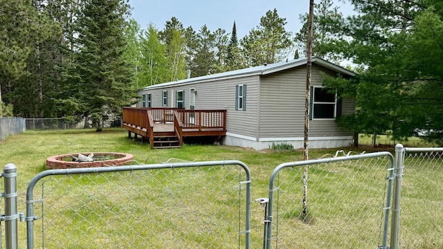 25673 Happy Hollow Rd, Park Rapids, MN 56470 - back of property featuring a gate and a wooden deck