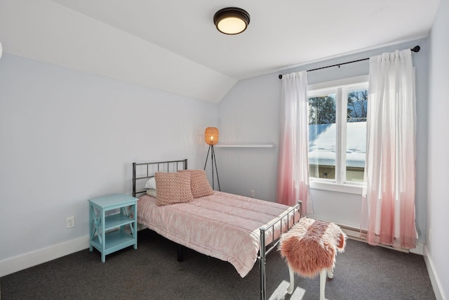 168 1st St, Excelsior, MN 55331 - carpeted bedroom with lofted ceiling and baseboards