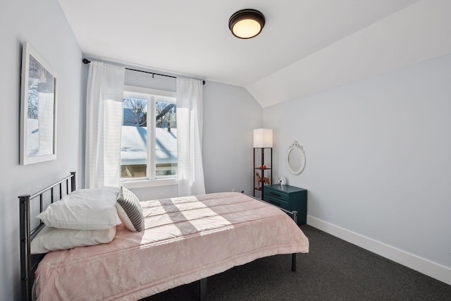 168 1st St, Excelsior, MN 55331 - carpeted bedroom featuring lofted ceiling and baseboards