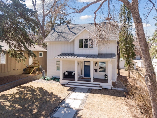 168 1st St, Excelsior, MN 55331 - modern farmhouse with a standing seam roof, metal roof, a shingled roof, covered porch, and board and batten siding