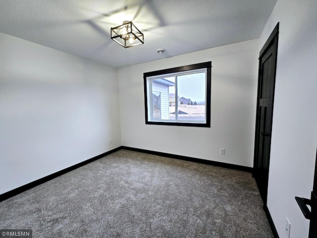 90 Balsam Ln, Madison Lake, MN 56063 - unfurnished room with carpet, baseboards, and a textured ceiling