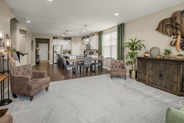 20555 Greenwood Ave, Lakeville, MN 55044 - living area with carpet floors, recessed lighting, baseboards, and wood finished floors