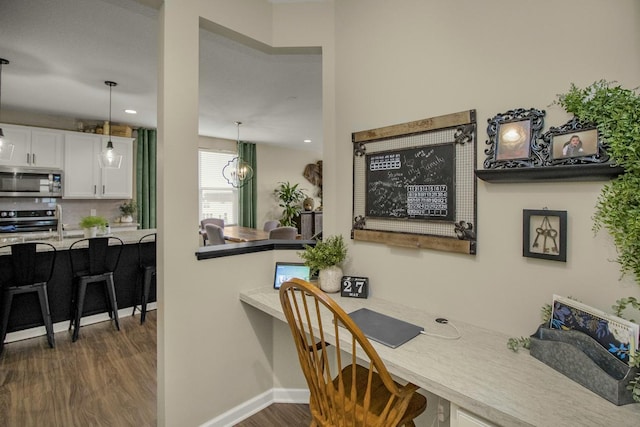 20555 Greenwood Ave, Lakeville, MN 55044 - office area featuring dark wood-style flooring and baseboards