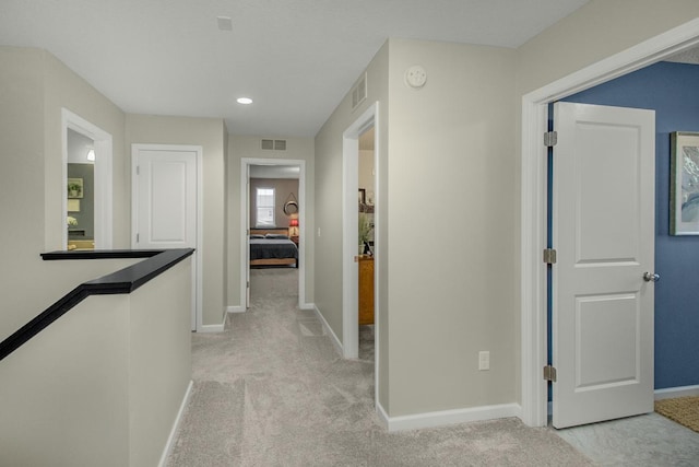 20555 Greenwood Ave, Lakeville, MN 55044 - hallway featuring light carpet and baseboards