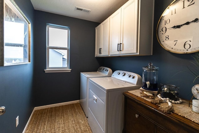 20555 Greenwood Ave, Lakeville, MN 55044 - washroom with cabinet space, washer and dryer, baseboards, and a textured ceiling