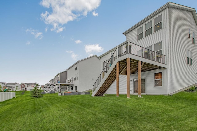 20555 Greenwood Ave, Lakeville, MN 55044 - back of house with stairs, a deck, and a lawn