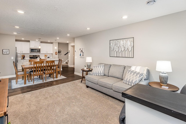 1259 Lower 143rd St E, Rosemount, MN 55068 - living room with recessed lighting, dark wood-style flooring, baseboards, and stairway