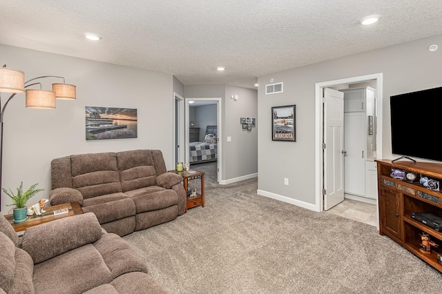 1259 Lower 143rd St E, Rosemount, MN 55068 - living room with light carpet, baseboards, recessed lighting, and a textured ceiling