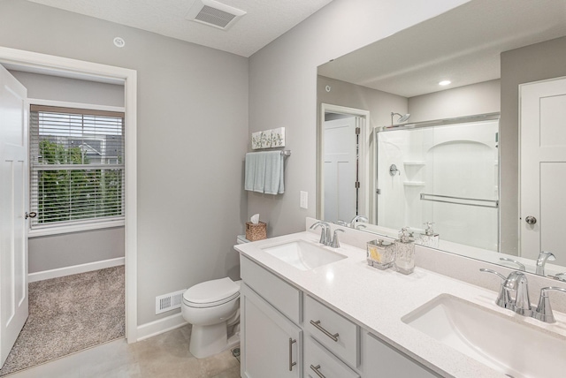 1259 Lower 143rd St E, Rosemount, MN 55068 - full bathroom with toilet, a shower stall, baseboards, and double vanity