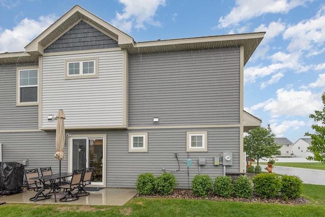 1259 Lower 143rd St E, Rosemount, MN 55068 - back of house with a patio area