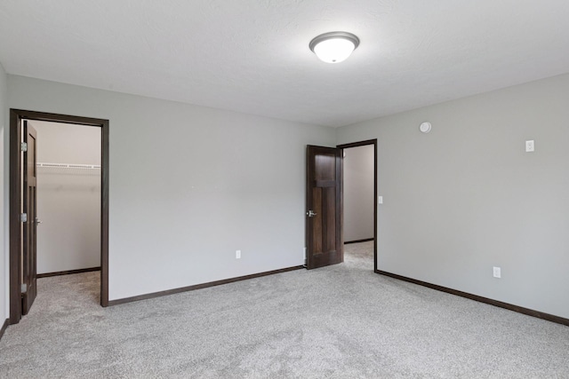 1429 10th Street Cir SE, New Prague, MN 56071 - unfurnished room featuring light colored carpet and baseboards