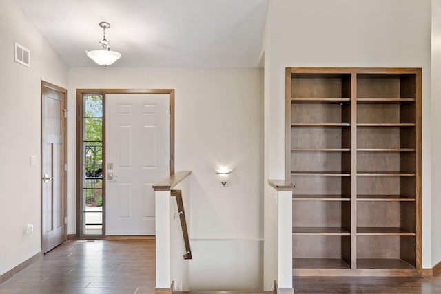 1429 10th Street Cir SE, New Prague, MN 56071 - foyer with dark wood-style flooring and baseboards
