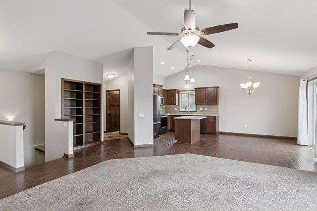 1429 10th Street Cir SE, New Prague, MN 56071 - kitchen with open floor plan, vaulted ceiling, light countertops, a center island, and a chandelier