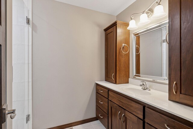 1429 10th Street Cir SE, New Prague, MN 56071 - bathroom featuring vanity, baseboards, and a shower