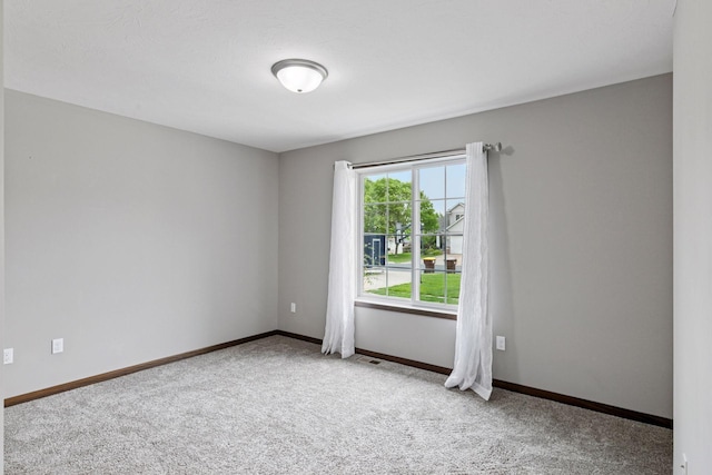 1429 10th Street Cir SE, New Prague, MN 56071 - carpeted empty room with baseboards