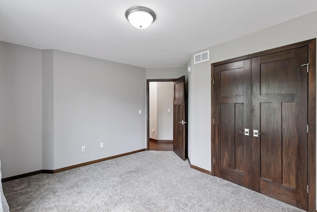 1429 10th Street Cir SE, New Prague, MN 56071 - unfurnished bedroom with carpet floors, a closet, and baseboards