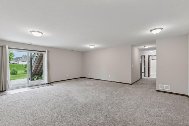 1429 10th Street Cir SE, New Prague, MN 56071 - spare room featuring carpet floors and baseboards