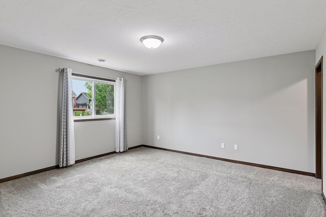 1429 10th Street Cir SE, New Prague, MN 56071 - empty room featuring carpet floors and baseboards