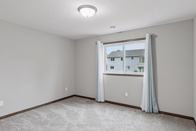 1429 10th Street Cir SE, New Prague, MN 56071 - carpeted empty room featuring baseboards