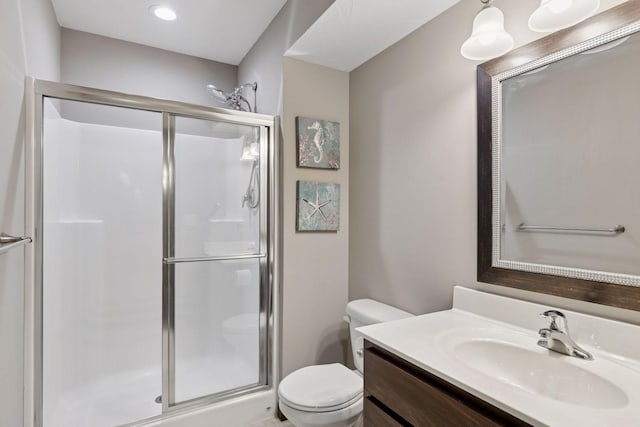 1429 10th Street Cir SE, New Prague, MN 56071 - full bathroom featuring a stall shower, toilet, vanity, and recessed lighting