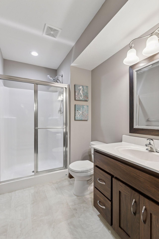 1429 10th Street Cir SE, New Prague, MN 56071 - bathroom with a shower stall, toilet, and vanity