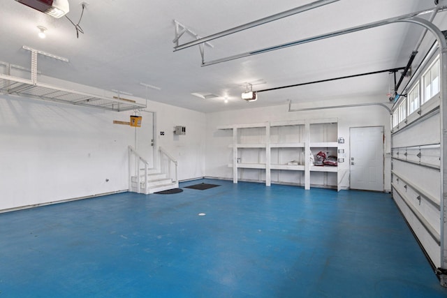 1429 10th Street Cir SE, New Prague, MN 56071 - garage featuring a garage door opener