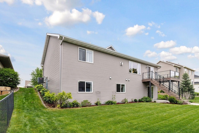 1429 10th Street Cir SE, New Prague, MN 56071 - back of house featuring stairs and a wooden deck