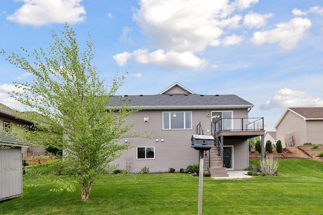 1429 10th Street Cir SE, New Prague, MN 56071 - rear view of property with a lawn and a deck