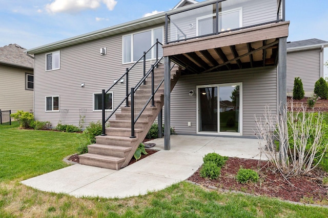 1429 10th Street Cir SE, New Prague, MN 56071 - rear view of property with a yard, a patio area, and stairway
