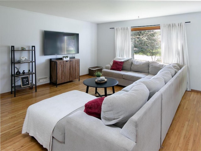 living area featuring light wood-style flooring
