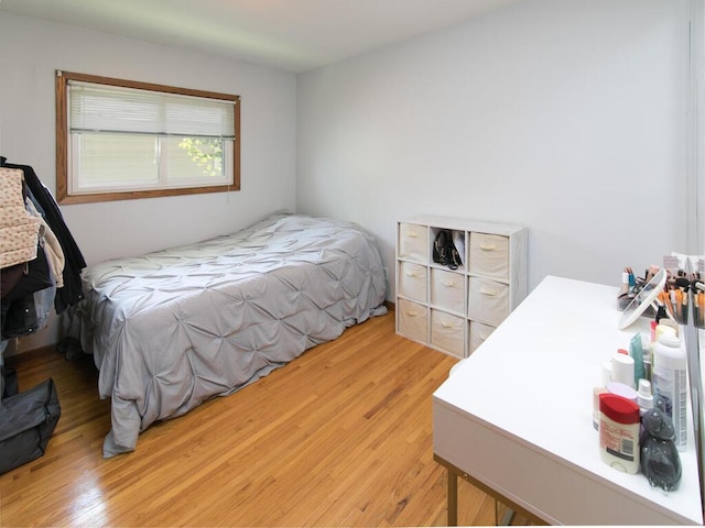 bedroom featuring light wood-style flooring