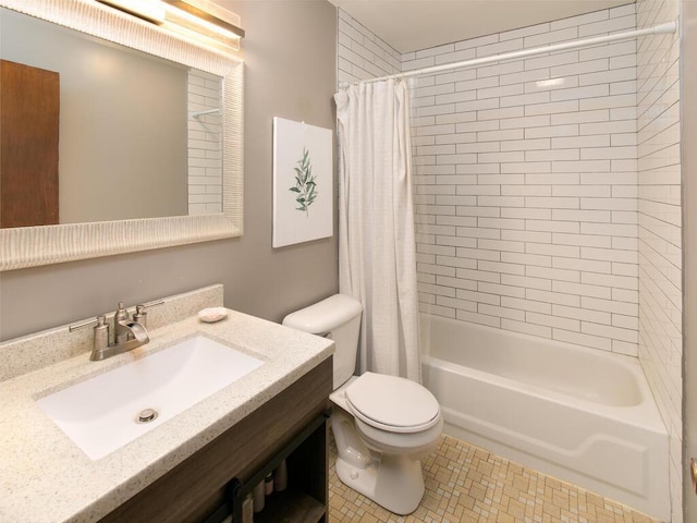 bathroom featuring toilet, shower / tub combo with curtain, and vanity