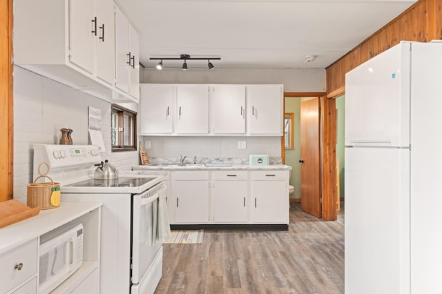 1605 White Ash Ln, Apple River Twp, WI 54810 - kitchen with white appliances, light countertops, white cabinetry, and light wood-type flooring