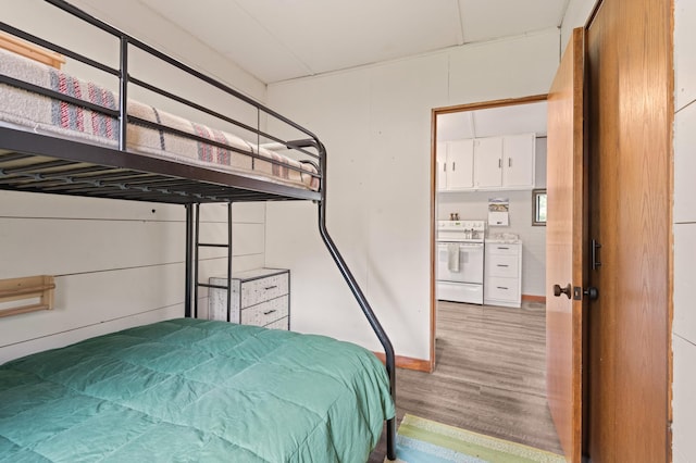1605 White Ash Ln, Apple River Twp, WI 54810 - bedroom with light wood-style flooring