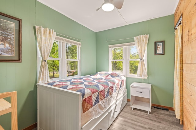 1605 White Ash Ln, Apple River Twp, WI 54810 - bedroom featuring wood finished floors and ceiling fan
