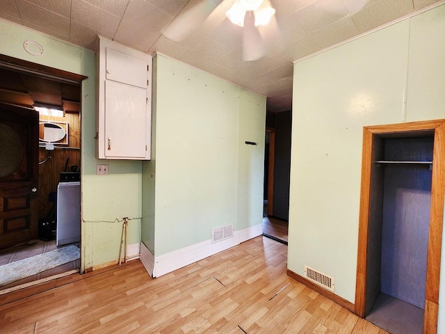 200 Jessie St, Marble, MN 55764 - unfurnished bedroom with light wood finished floors, baseboards, and a closet