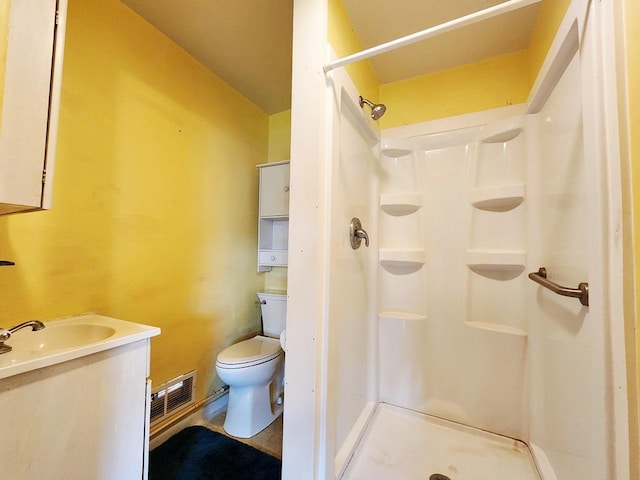 200 Jessie St, Marble, MN 55764 - bathroom featuring toilet, a shower stall, and vanity