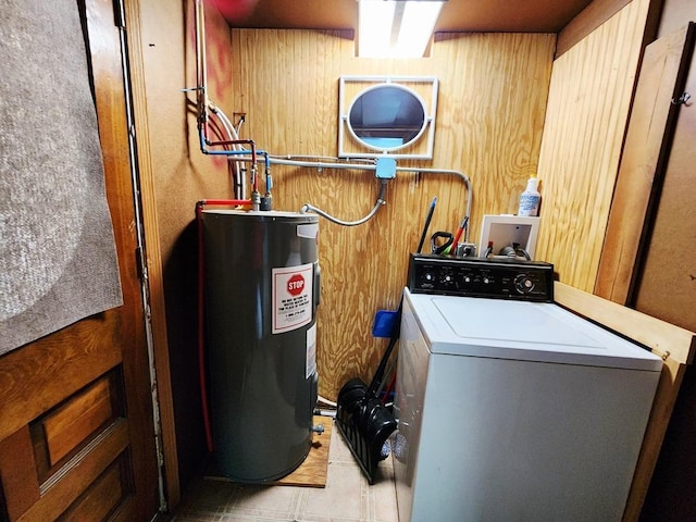 200 Jessie St, Marble, MN 55764 - washroom with washer / dryer, electric water heater, and wood walls