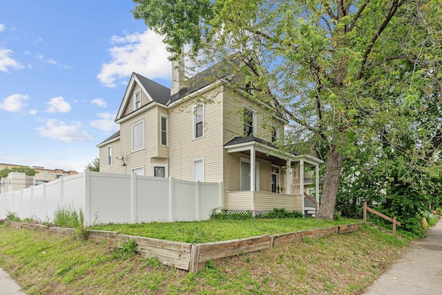 2744 Stevens Ave, Minneapolis, MN 55408 - view of property exterior featuring a chimney