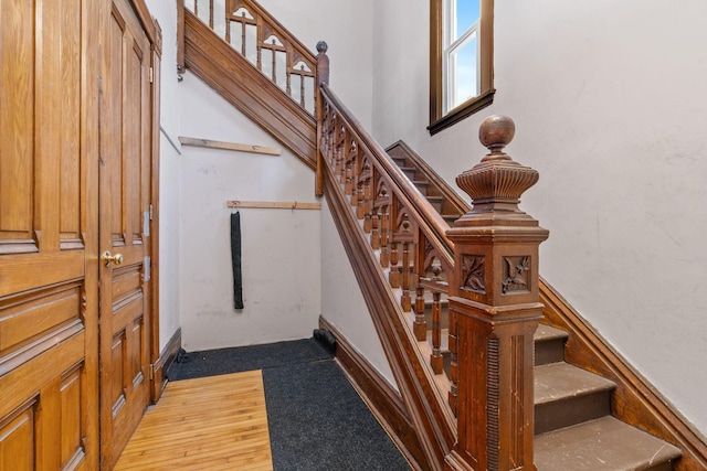 2744 Stevens Ave, Minneapolis, MN 55408 - stairway featuring wood finished floors