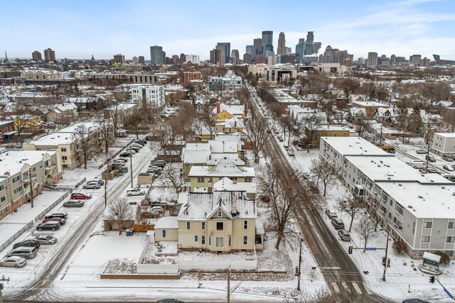 2744 Stevens Ave, Minneapolis, MN 55408 - snowy aerial view featuring a skyline view