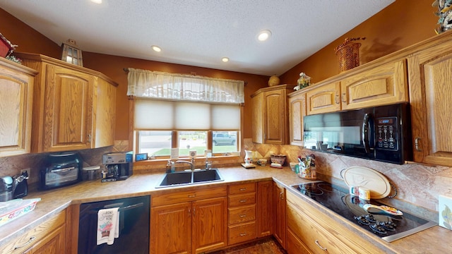 1720 Hale Dr, Albert Lea, MN 56007 - kitchen with black appliances, a sink, light countertops, tasteful backsplash, and recessed lighting