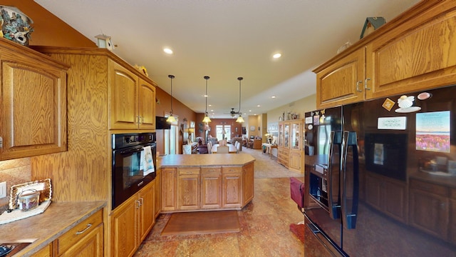 1720 Hale Dr, Albert Lea, MN 56007 - kitchen featuring black appliances, a peninsula, open floor plan, ceiling fan, and light countertops