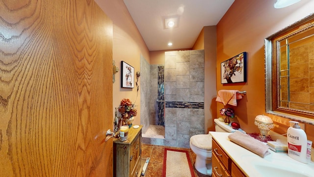 1720 Hale Dr, Albert Lea, MN 56007 - full bath with toilet, vanity, walk in shower, and tile patterned flooring